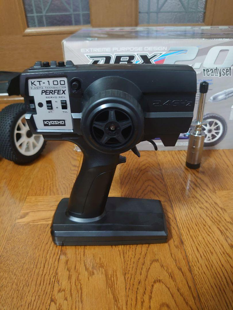 Laden Sie das Bild in Galerie -Viewer, Kyosho DBX 2.0 ReadySet GP Buggy New Unused - Used
