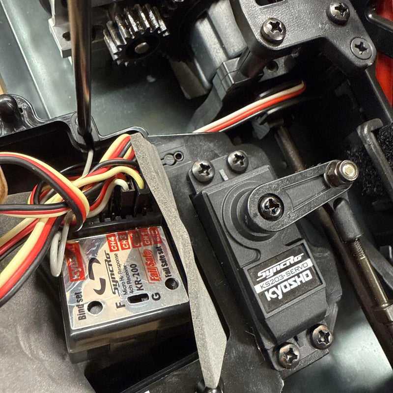 Load image into Gallery viewer, Used Kyosho 1/8 EP Psycho Kruiser RC Car Displayed with Manual and Tools
