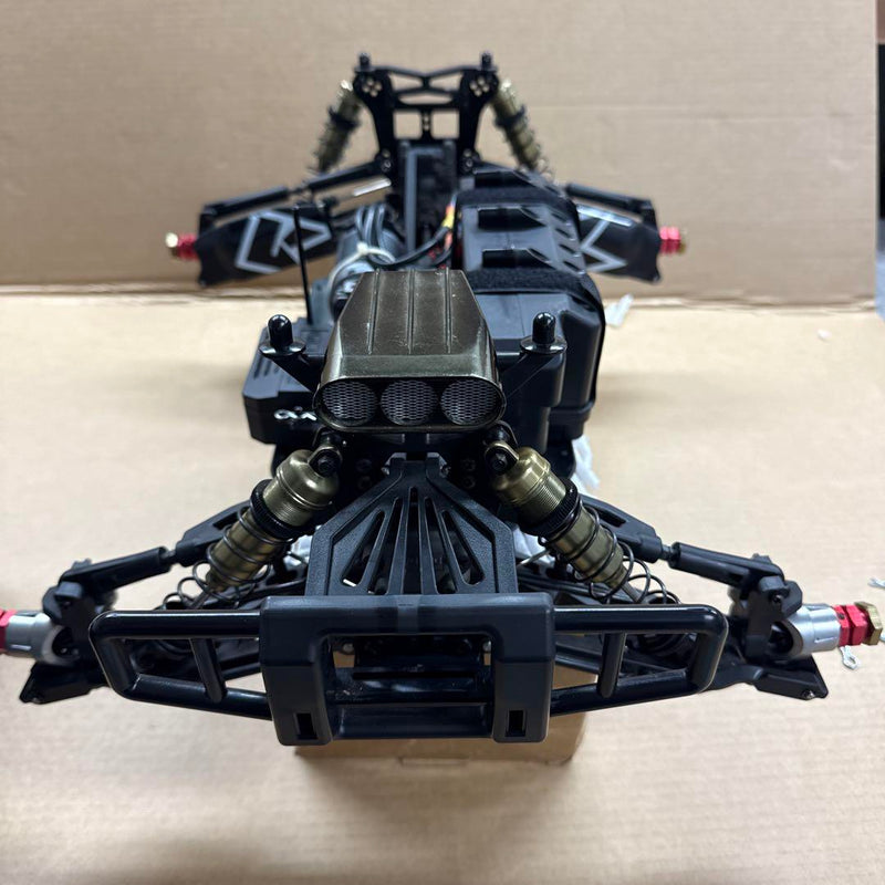 Load image into Gallery viewer, Used Kyosho 1/8 EP Psycho Kruiser RC Car Displayed with Manual and Tools

