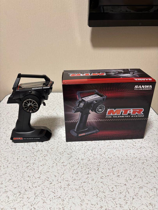 Used Tamiya TT-02 Assembled Chassis with Sanwa MT-R Radio and Extra Body