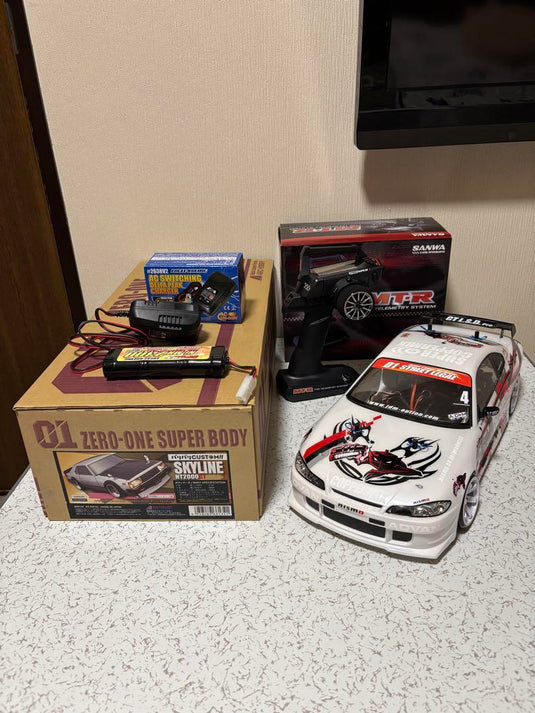 Used Tamiya TT-02 Assembled Chassis with Sanwa MT-R Radio and Extra Body