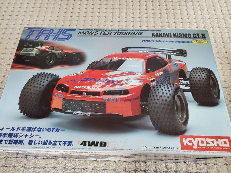Load image into Gallery viewer, Used Kyosho 1/10 Xanavi Nismo GTR 4WD Engine RC Car Assembled
