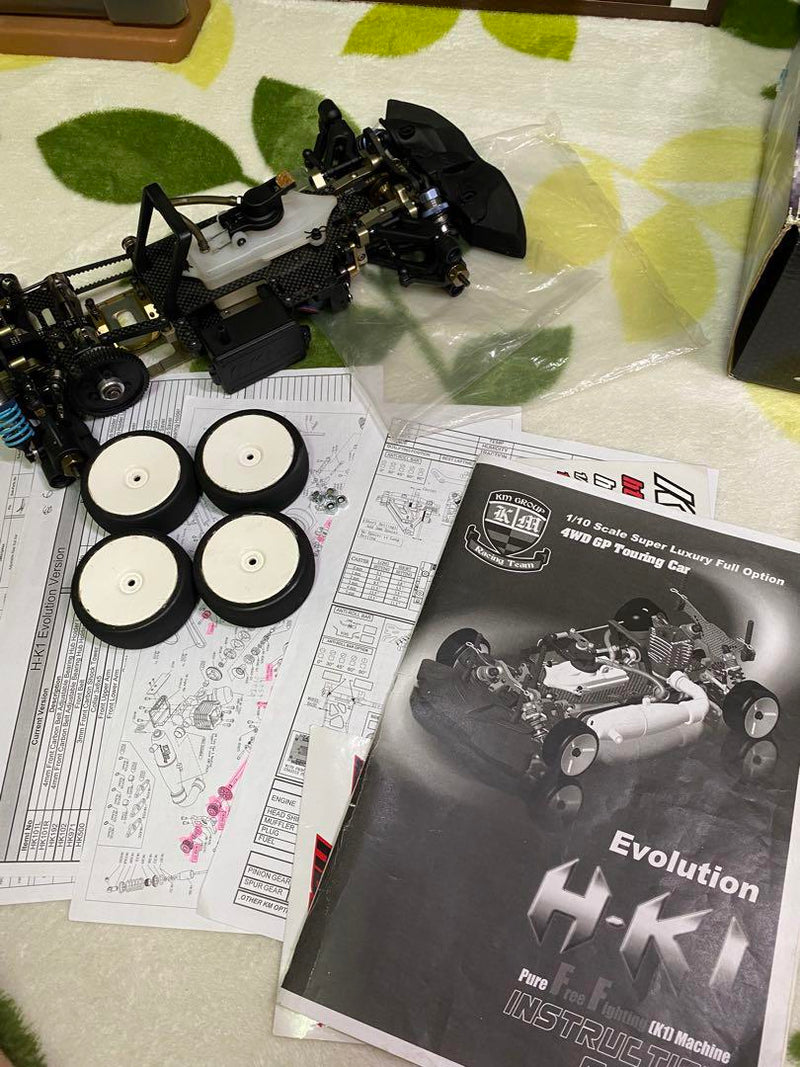 Load image into Gallery viewer, Used KM Racing HK1 Evolution 1/10 RC Car Chassis with Sanwa Servo Used
