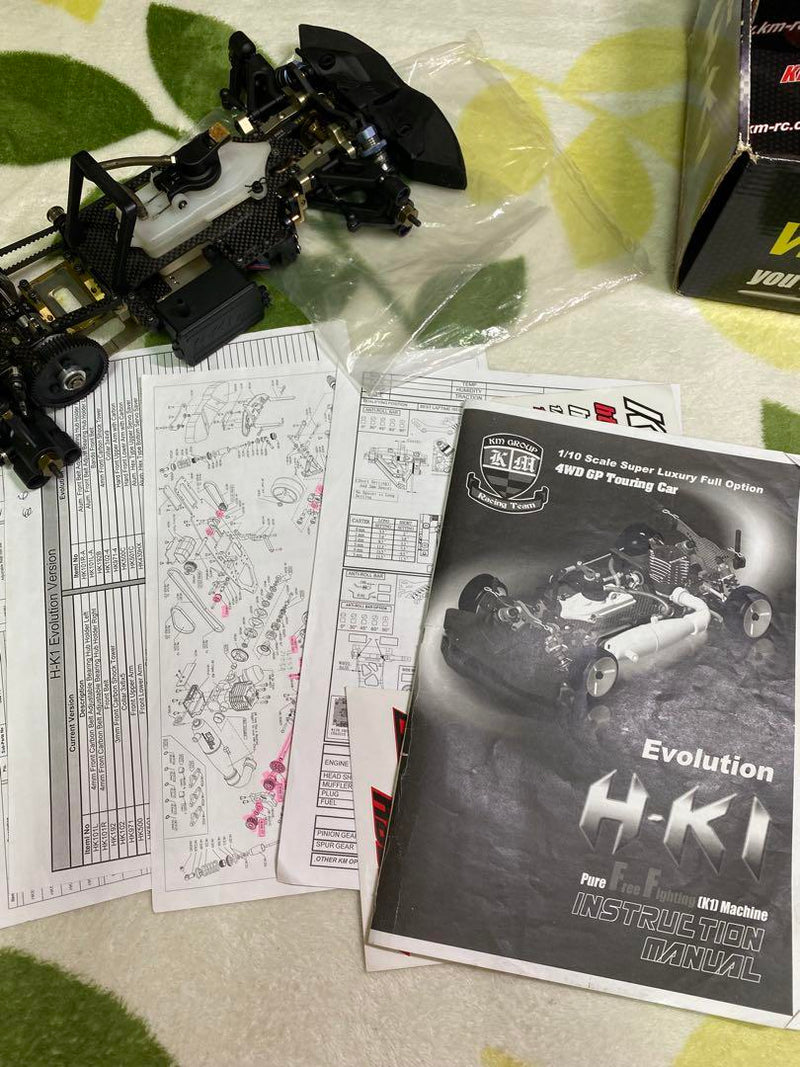 Load image into Gallery viewer, Used KM Racing HK1 Evolution 1/10 RC Car Chassis with Sanwa Servo Used
