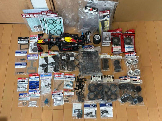 Used Tamiya TRF102 Partially Assembled with Futaba Electronics and Red Bull Body