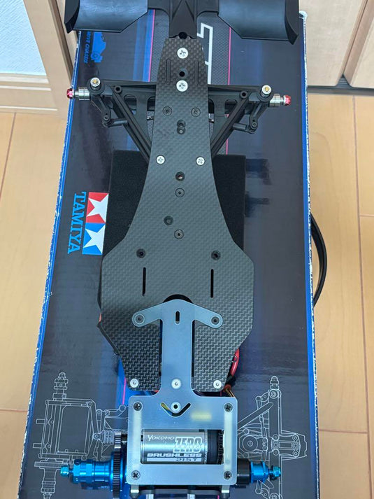 Used Tamiya TRF102 Partially Assembled with Futaba Electronics and Red Bull Body