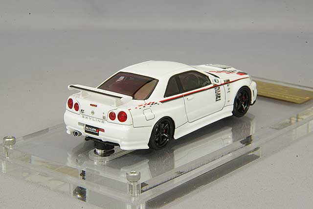 Cargue la imagen en el visor de la galería, Modelo de encendido 1/64 Nismo R34 GT-R R Tune White con ruedas Nismo LMGT4 de 19 pulgadas (negro) IG2575
