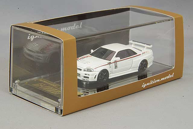 Cargue la imagen en el visor de la galería, Modelo de encendido 1/64 Nismo R34 GT-R R Tune White con ruedas Nismo LMGT4 de 19 pulgadas (negro) IG2575
