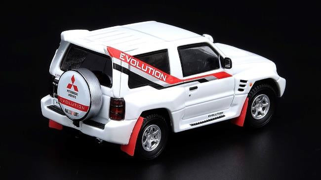 Load image into Gallery viewer, INNO Models 1/64 Mitsubishi Pajero Evolution White With Extra Wheels
