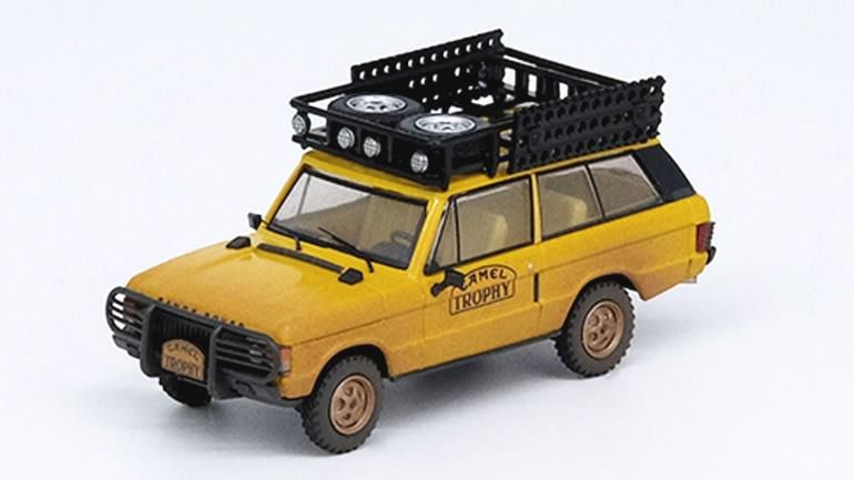 Load image into Gallery viewer, INNO Models 1/64 Range Rover Classic Camel Trophy 1982 Weathered with Toolbox (1), Fuel Tanks (4)
